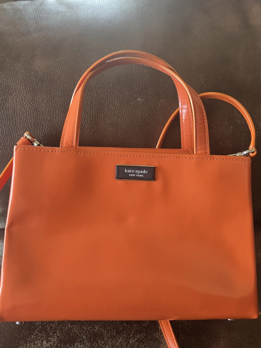 kate spade New York glossy orange mini satchel